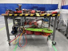 Lot of tools, contains Milwaukee grinders, drills, a riveter, and chargers