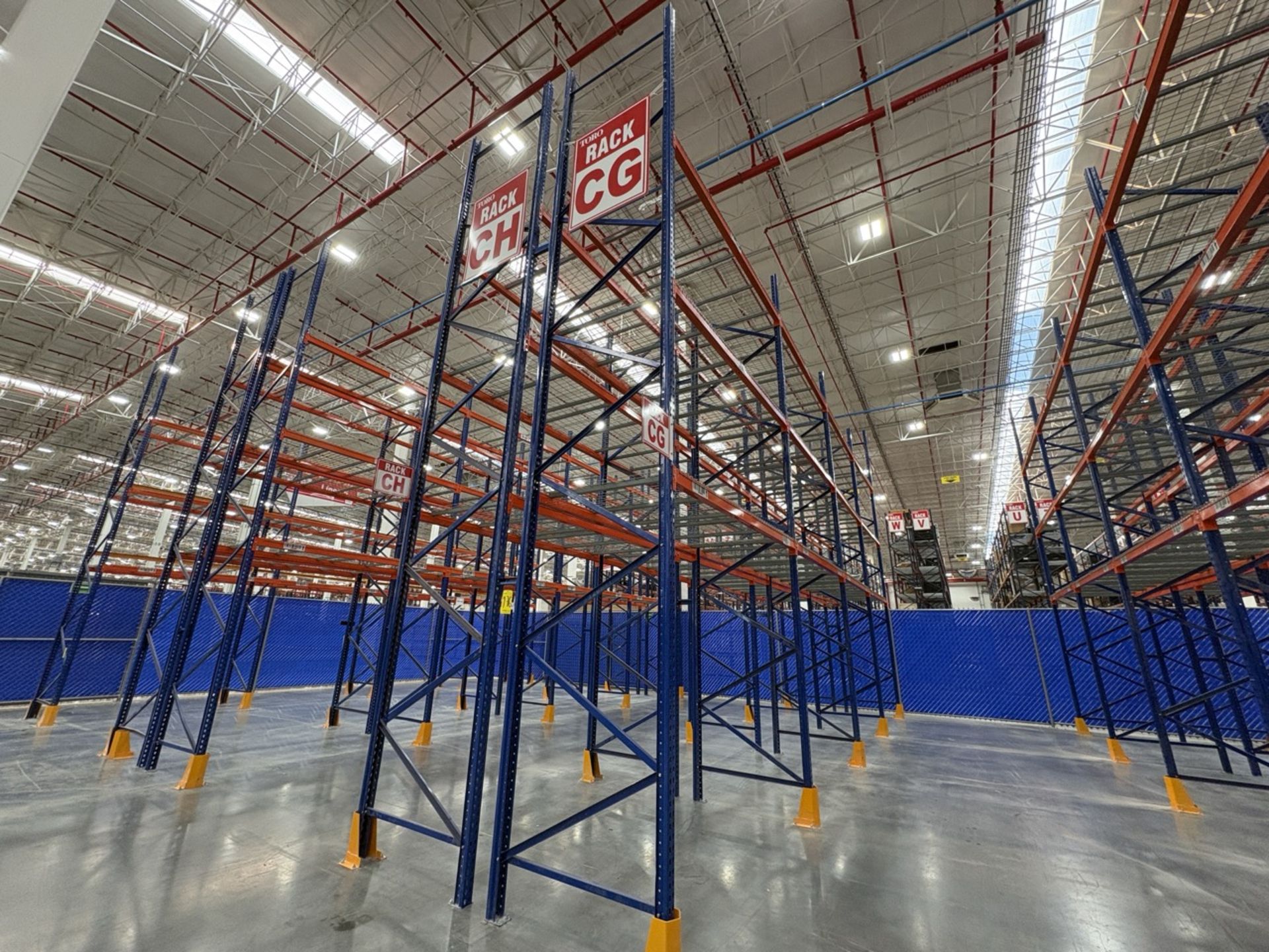 2 rows of storage racks measuring 11 meters long, 6 meters high, and 1. ...