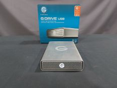 GDRIVE, G1, USB, COMPACT, 4,000 GB, HIGH PERFORMANCE STORAGE HARDRIVE, S/N PEJG3S9S (TAG 21)