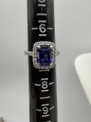 18k White Gold Tanzanite .75 Diamond Ring, 6.7 Gra 18k White Gold Tanzanite .75 Diamond Ring, 6.7...