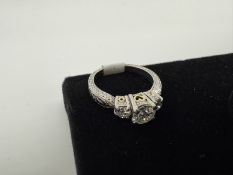 Platinum Ring .75 dia H-VS2 .60 Side Stone, 8.3 Gr Platinum Ring .75 dia H-VS2 .60 Side Stone, 8....