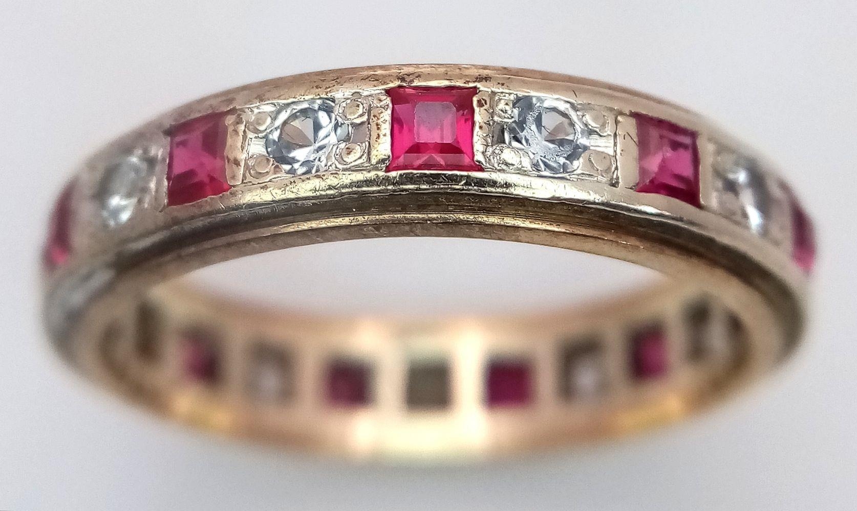 A 9K YELLOW GOLD DIAMOND & RUBY FULL ETERNITY RING. 3G. SIZE N. ADAM2003. - Image 2 of 5