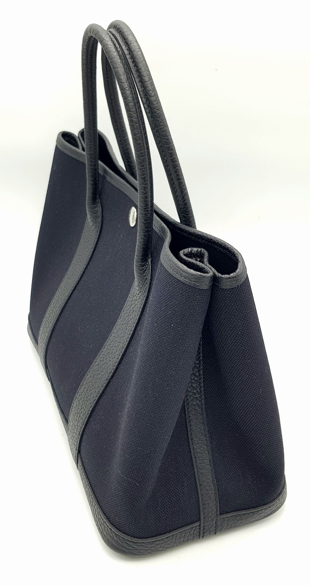 A Hermès Garden Party 30 Black Canvas and Leather Tote Bag. Black canvas exterior with black - Image 2 of 12