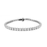 A Lab-Grown 14ctw Diamond Line Bracelet set in 9K White Gold. 7 inch length. 15.98g total weight.