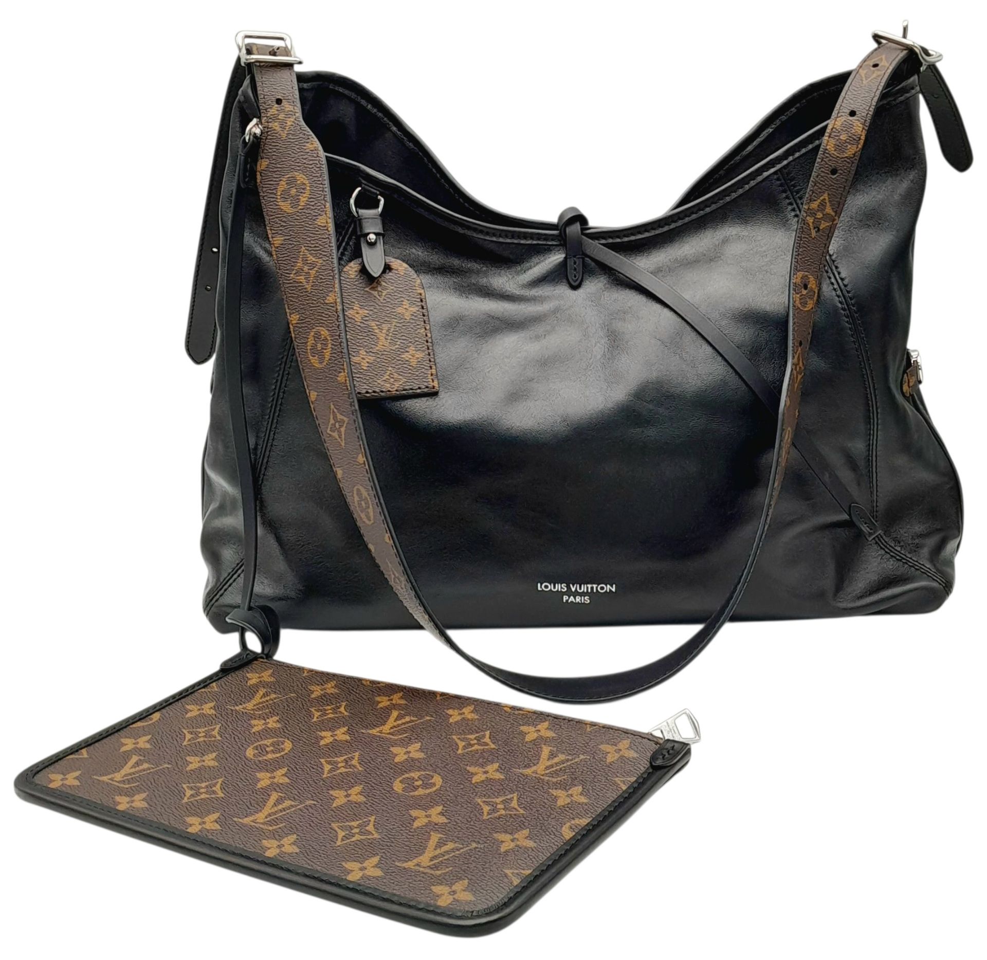 A Louis Vuitton Black Leather Graceful MM Hobo Bag. Black leather with monogram-coated canvas