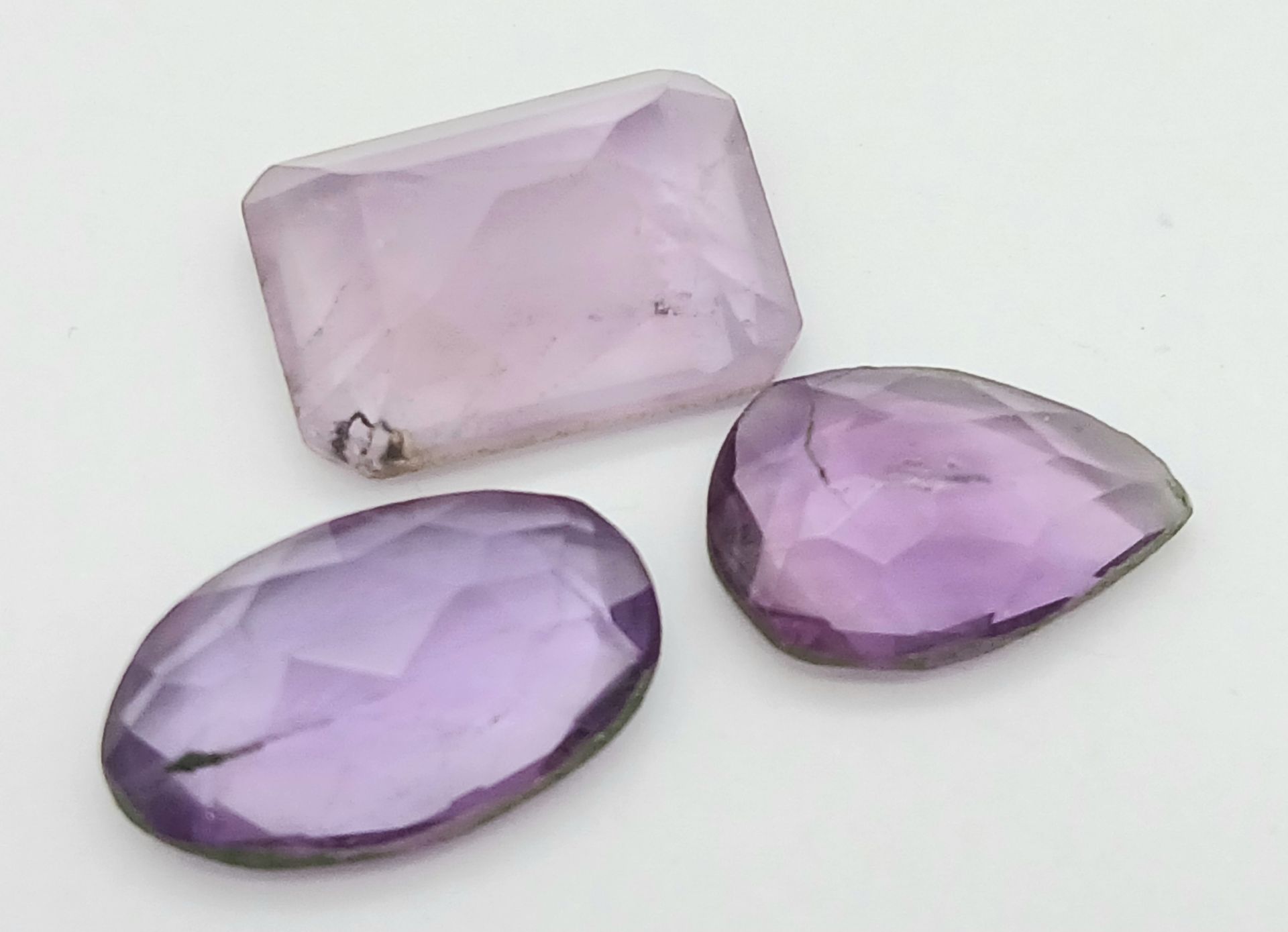 Three Pieces of 16ctw Faceted Amethyst Gemstones. Mixed shapes. Ref: V.C.62 - Image 2 of 3