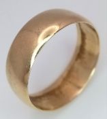 An 18K Yellow Gold Band Ring. UK hallmarks. 7mm width. 4.05g.