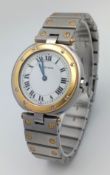A Cartier Santos Ronde Bi-Metal Ladies Quartz Watch. Stainless steel bracelet with gold accents.
