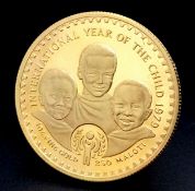 A 1979 Lesotho Year of the Child 22K Gold Proof Condition 1oz Coin. Face value of 250 Maloti. 2000