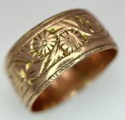 A 9K ROSE GOLD DECORATED BAND RING , 8mm WIDTH 4.4gmd size R