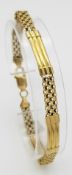 A VERY ATTRACTIVE 14K GOLD UNUSUAL BAR GATE BRACELET . 9.5gms 20cms