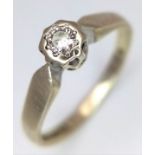 A 9K Yellow Gold Diamond Solitaire Ring. 0.20ct. Size L. 2g.