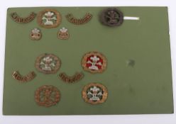 Grouping of Military Badges to the South Lancashire Regiment.