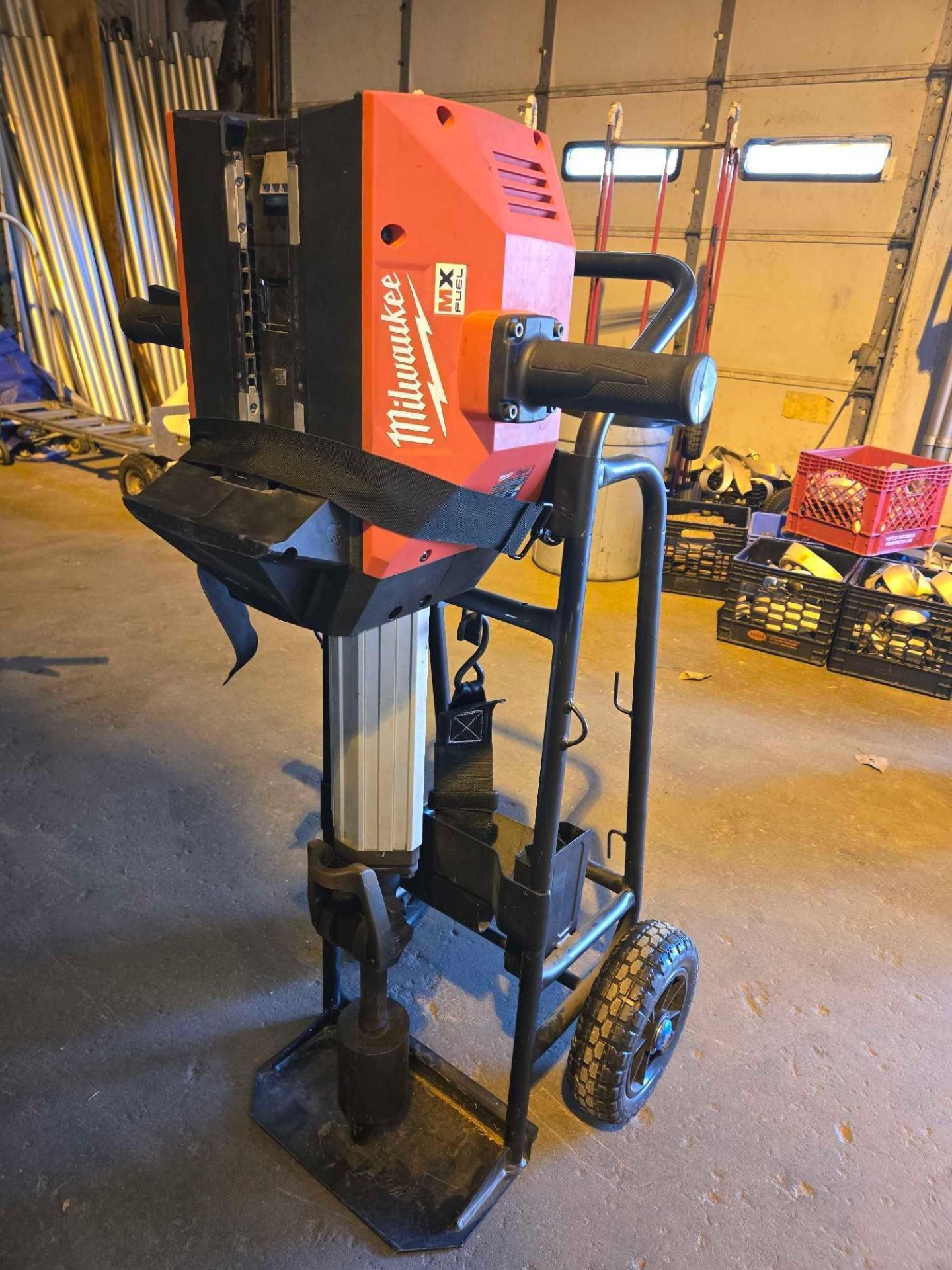 Milwaukee cordless stake driver with battery and 2 bits