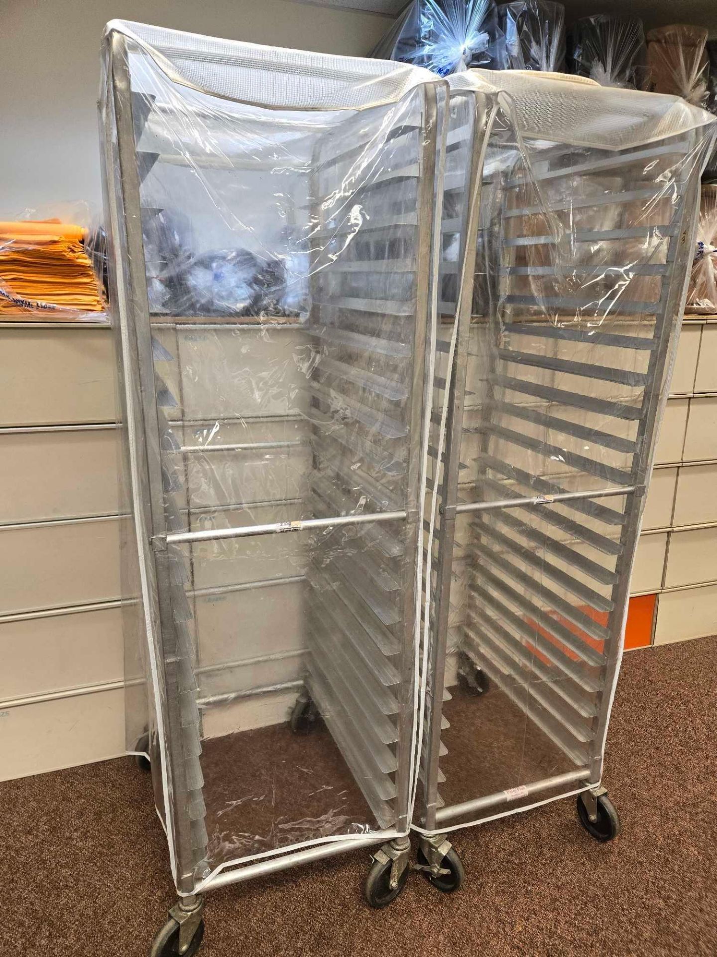 Lot of (2) 20 tray holder service rolling racks