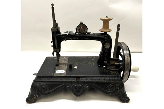 A 19th century table top sewing machine, 31 cm wide Provenance:  A single owner collection, from the - Image 1 of 3