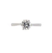 A late 20th century platinum single stone diamond ring,