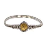 A diamond set Tissot watch,