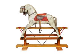 A CHILD'S DAPPLE GREY PAINTED ROCKING HORSE, LATE 1960S