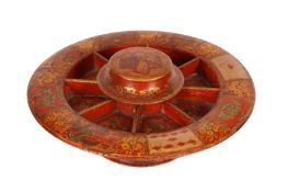 A REGENCY RED JAPANNED, DECOUPAGE, PAINTED AND GILDED WOOD POPE JOAN GAME