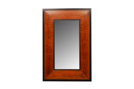 A CONTEMPORARY WOODEN-FRAMED MIRROR