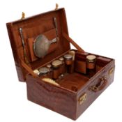 A George V sterling silver gilt fitted travelling vanity or dressing case, London 1925 by Drew and S