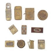 A group of three early 20th century novelty brass vesta cases
