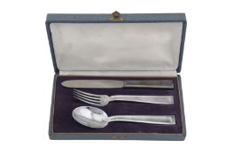 An early 20th century French Art Deco 950 standard silver christening set, Paris circa 1920 by Ravin