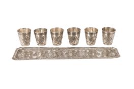 A mid-20th century Persian (Iranian) silver shots set on tray, Isfahan circa 1960