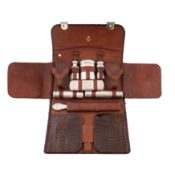 An Edwardian sterling silver fitted travelling men’s vanity or dressing case ort valise, London 1904