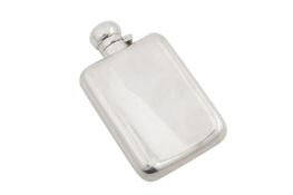 A George V sterling silver spirit hip flask, Birmingham 1919 by Saunders and Shepard