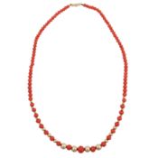 λ A coral bead necklace