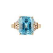 A topaz and diamond ring