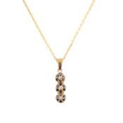A black and white diamond pendant necklace