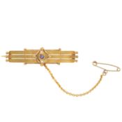A sapphire and seed pearl gold brooch, circa 1894