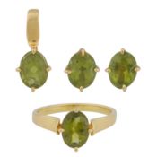A peridot ring, pendant, and stud earrings suite