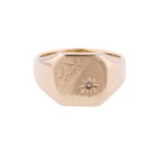 A diamond signet ring
