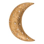 Christian Dior | A crescent half moon brooch