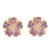 A pair of amethyst and paste flower stud earrings