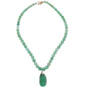 A jadeite pendant necklace