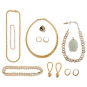 A collection of silver and costume jewellery with a jadeite pendant