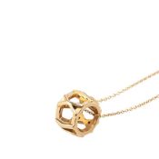 Tiffany & Co. Atlas X Open Necklace in 18K Yellow Gold for Women.