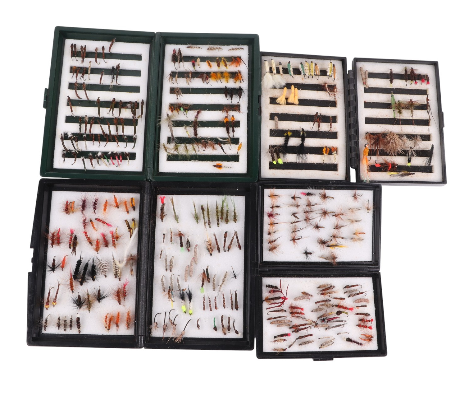 A large quantity of trout and salmon fly fishing flies, mostly in cases.