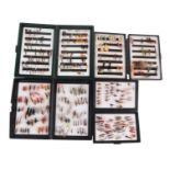 A large quantity of trout and salmon fly fishing flies, mostly in cases.
