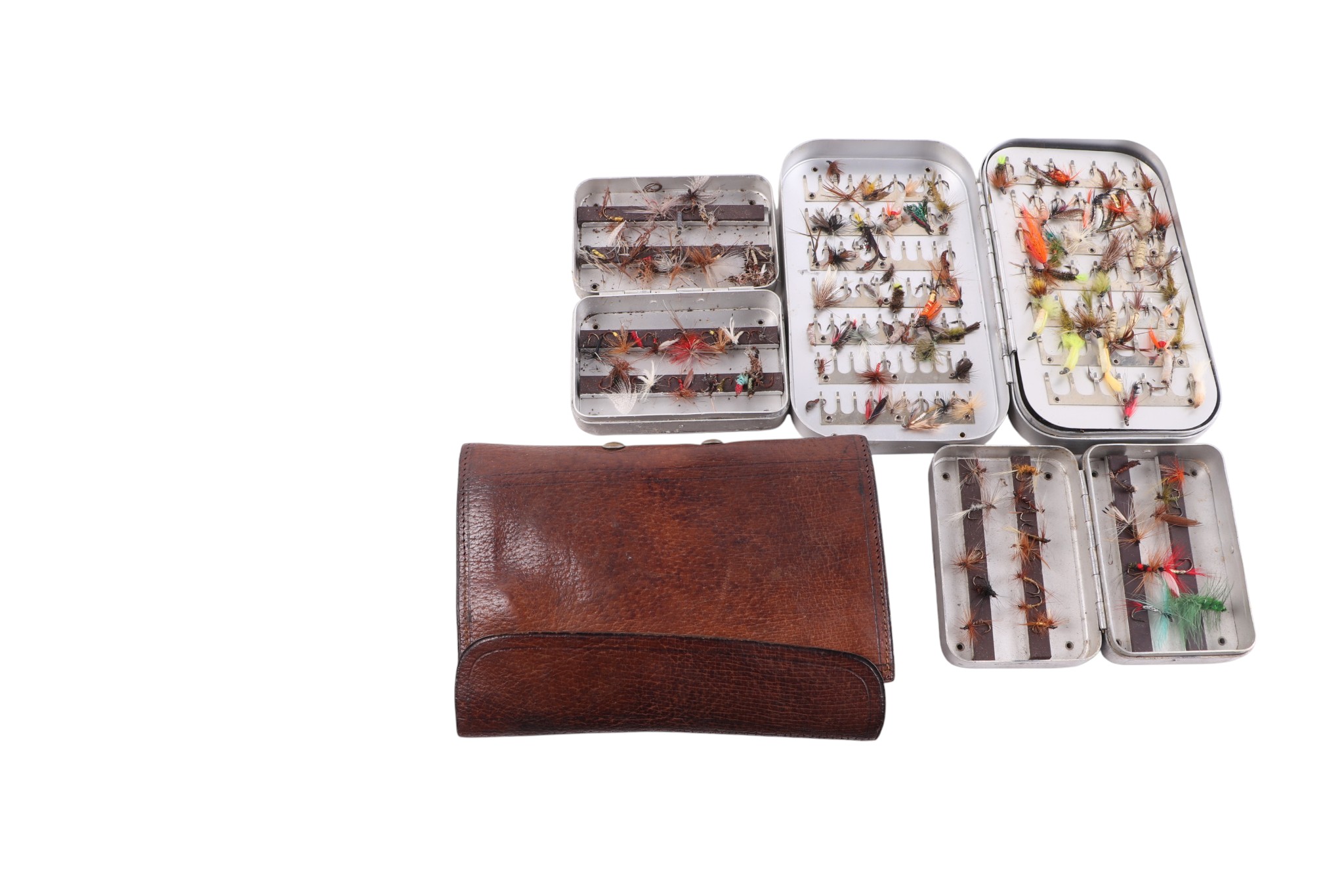 Three vintage Wheatley Silmalloy Fly Boxes containing a quantity of trout and salmon flies, together