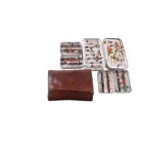 Three vintage Wheatley Silmalloy Fly Boxes containing a quantity of trout and salmon flies, together