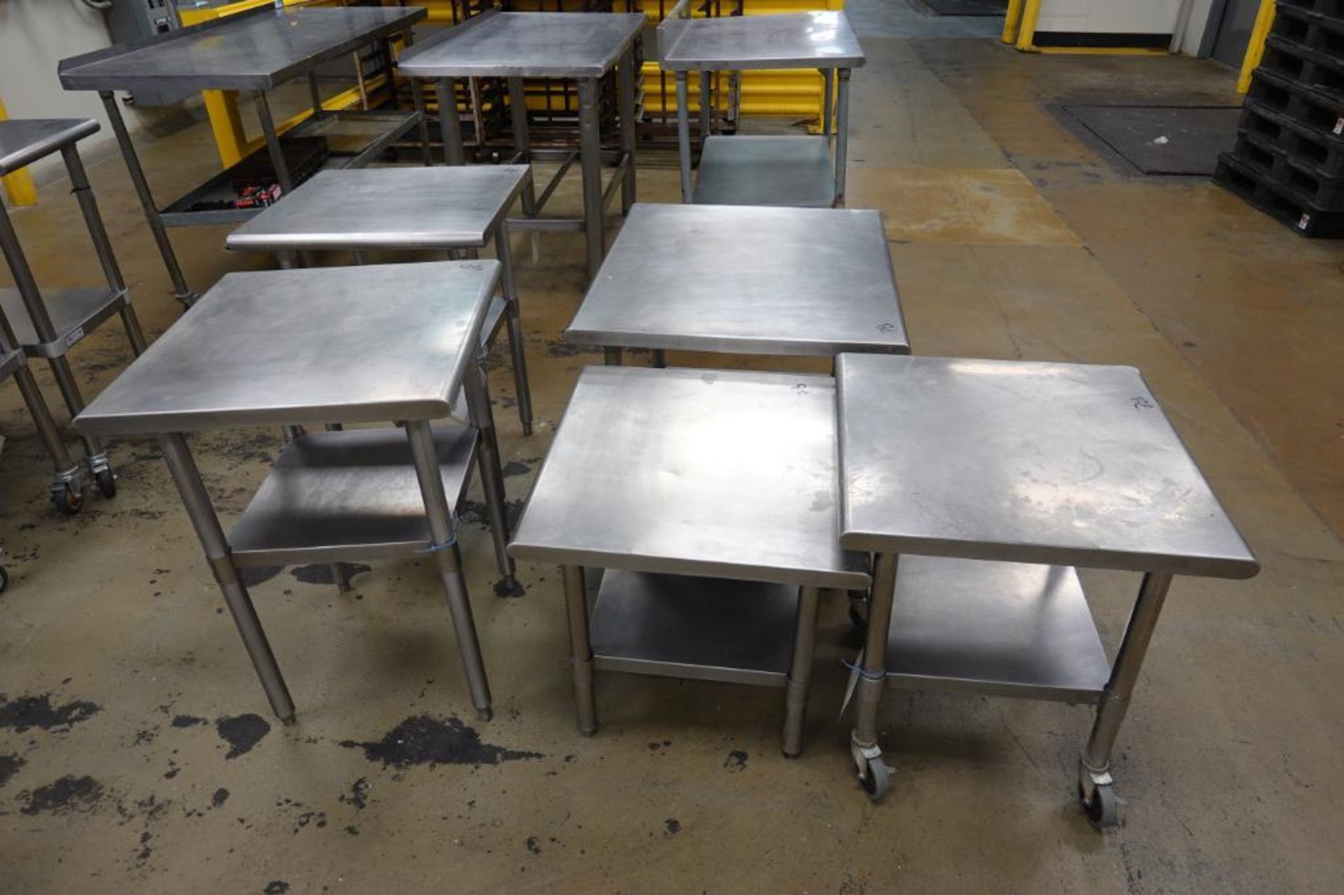 Ss Table Column (5) assorted SS tables ***Simple Rigging and Loading Fee: $50***