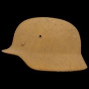 WWII Nazi German M40 Helmet, featuring original sand camouflage.