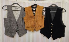 Brown suede lady's waistcoat with check wool back and lining, labelled 'Made in England by