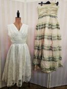 1950's white nylon and satin short gown, sleeveless, the overskirt printed with rose design, a